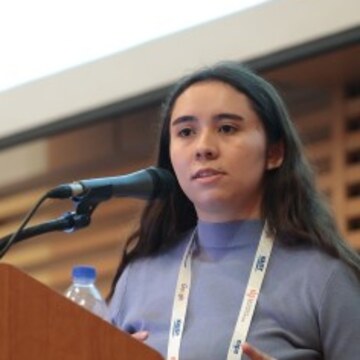 Angela L. Jimenez presenting at IEEE ISMAR 2025